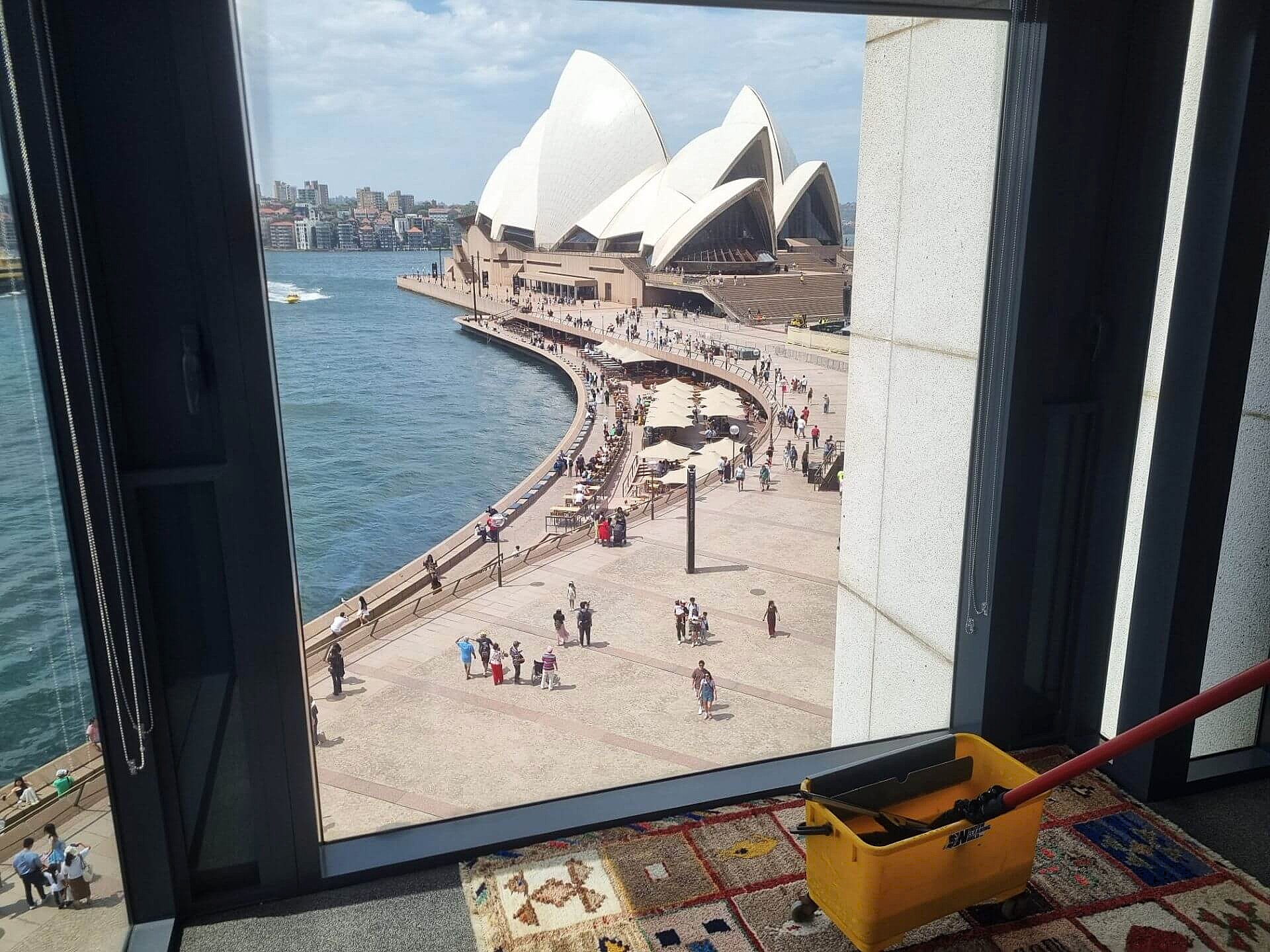 Residential window cleaning at Bennelong Apartments, 1 Macquarie St, with a crystal-clear view of the Sydney Opera House.
